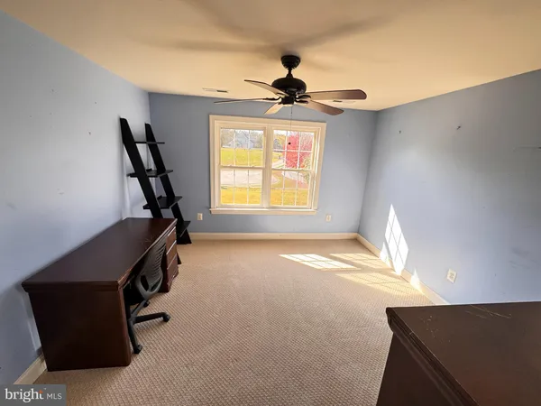 a view of a room with windows