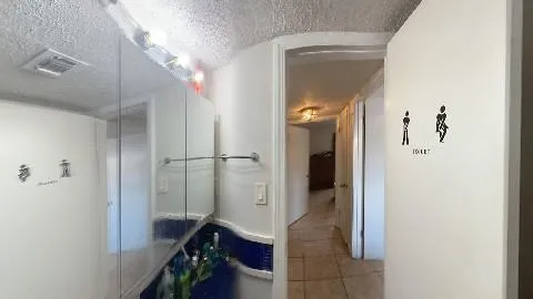a view of hallway with shower