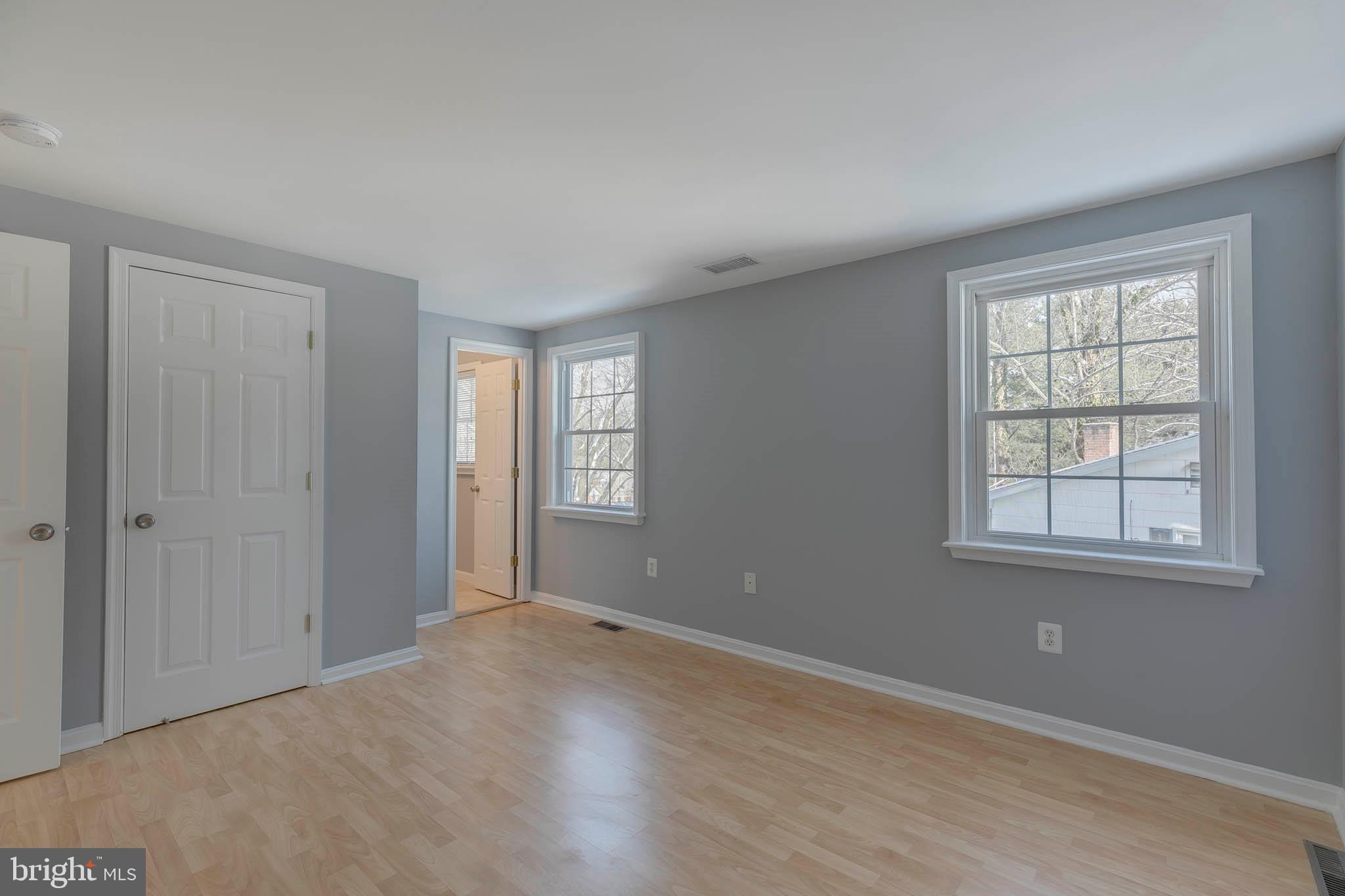 5133 West Running Brook Road Columbia, MD 21044 - Photo 20 of 44 an empty room with windows
