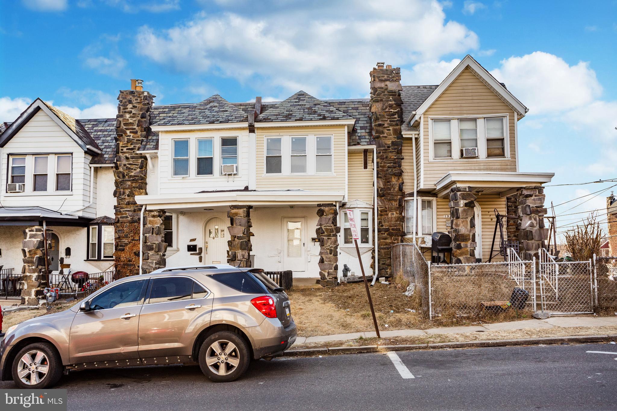 196 Springton Road Upper Darby, PA 19082 - Photo 1 of 27 a car parked in front of a house
