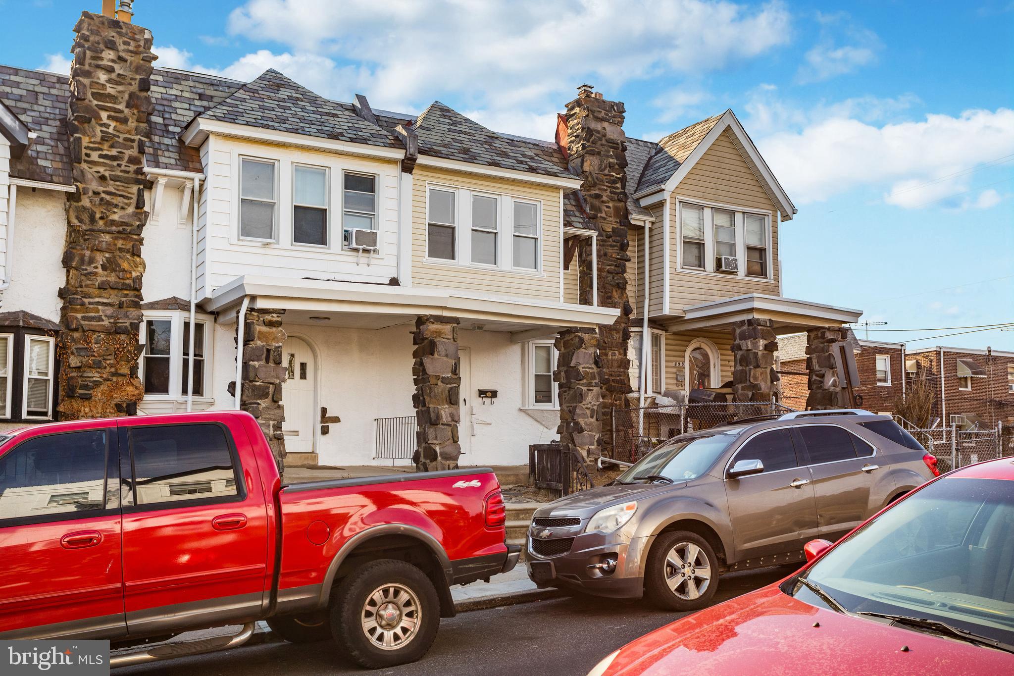 196 Springton Road Upper Darby, PA 19082 - Photo 2 of 27 a front view of a house with parking space