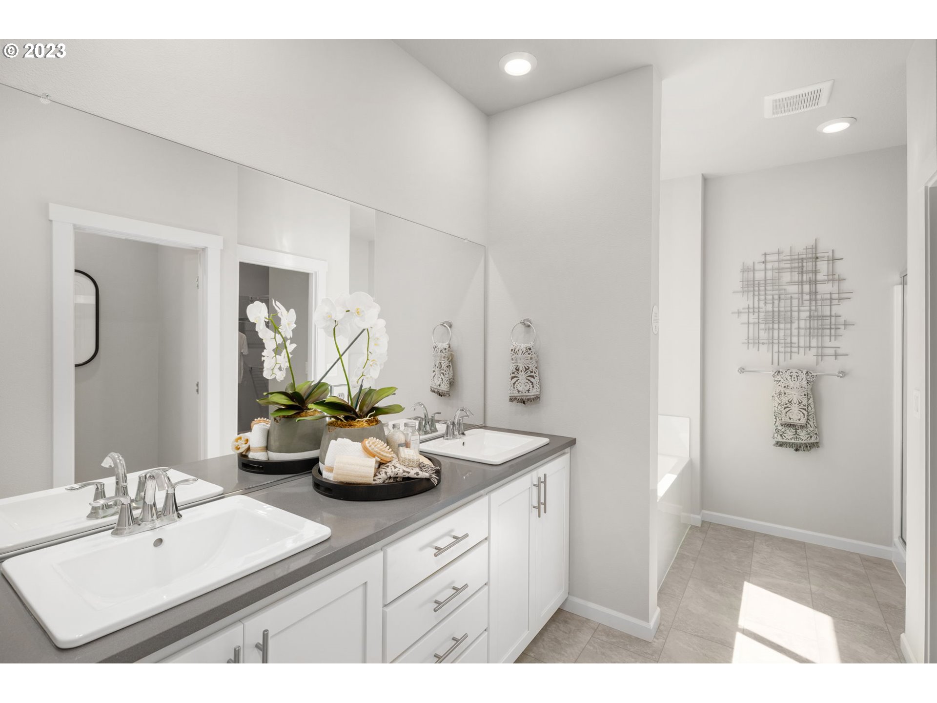 2364 Southeast Teal Avenue Gresham, OR 97080 - Photo 16 of 20 a bathroom with a sink mirror and a shower