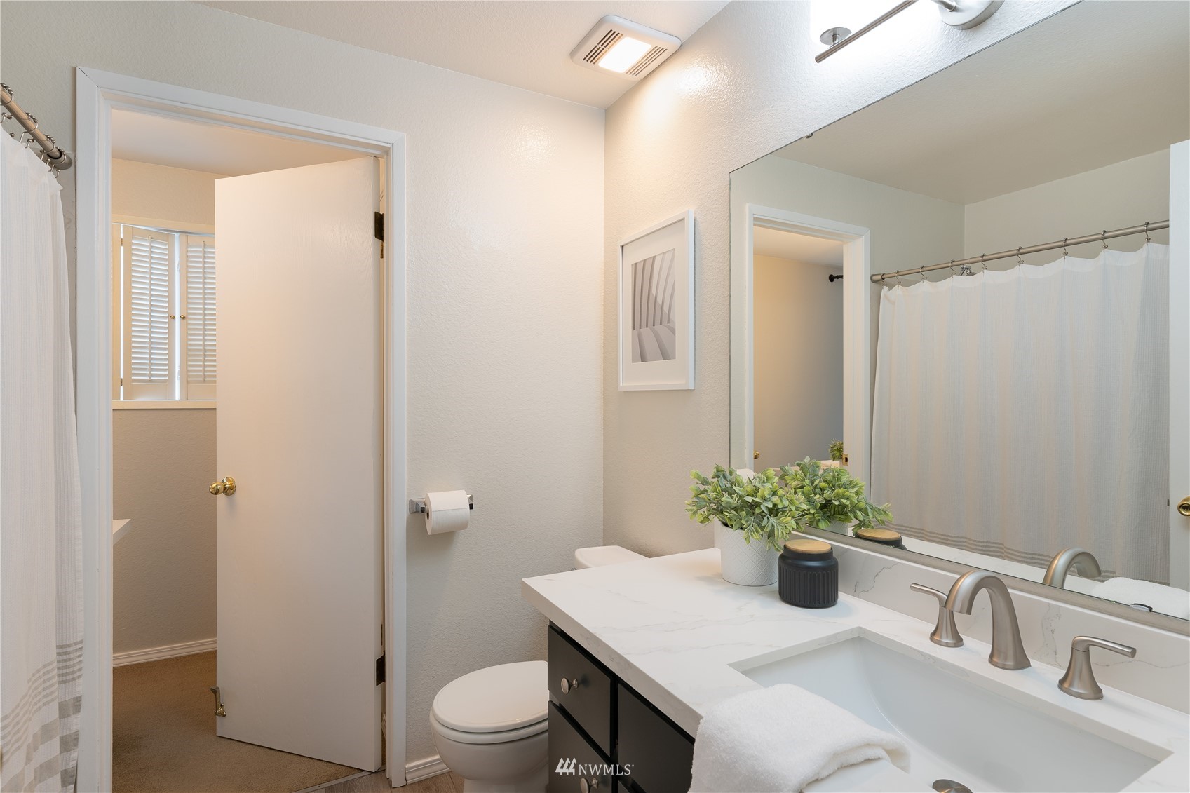 212 225th Street Southwest Bothell, WA 98021 - Photo 13 of 31 a bathroom with a sink a toilet and shower