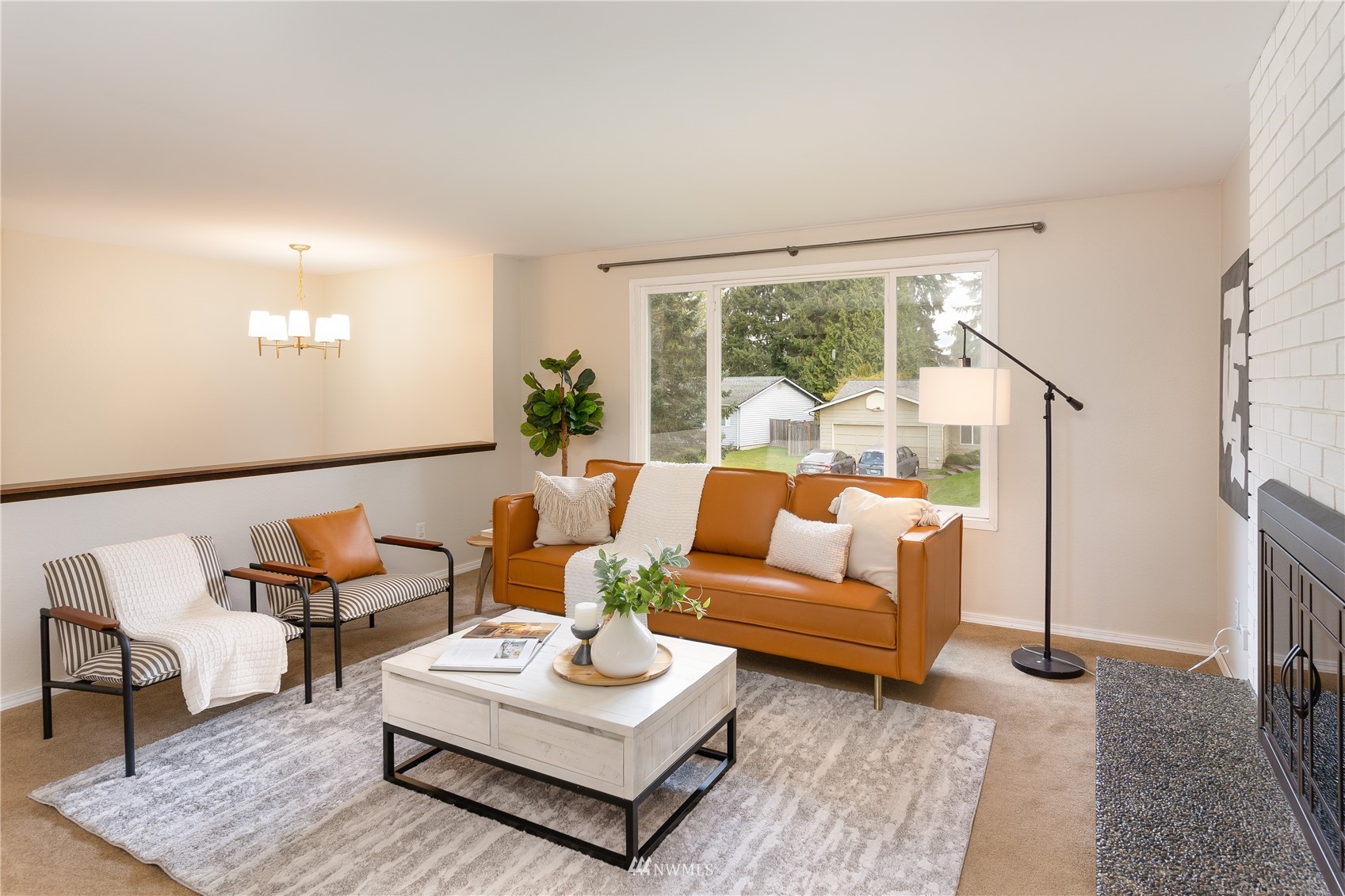 212 225th Street Southwest Bothell, WA 98021 - Photo 5 of 31 a living room with furniture and a large window