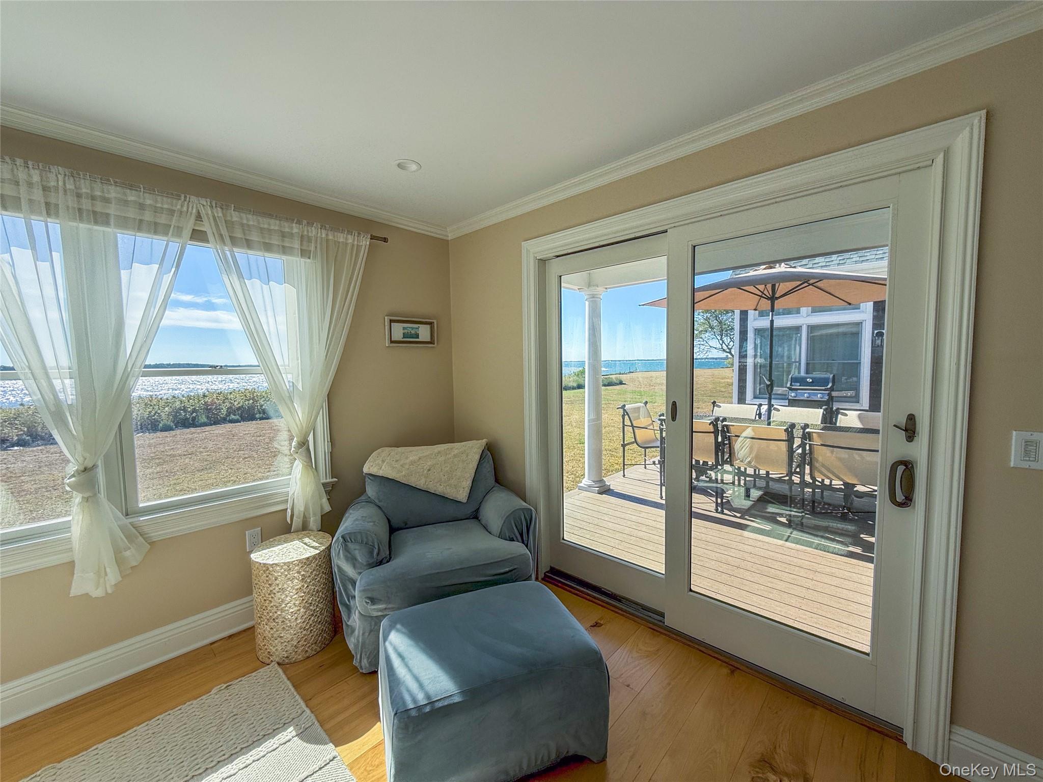 2450 Peters Neck Road Orient, NY 11957 - Photo 12 of 22 master bedroom with deck and bay view