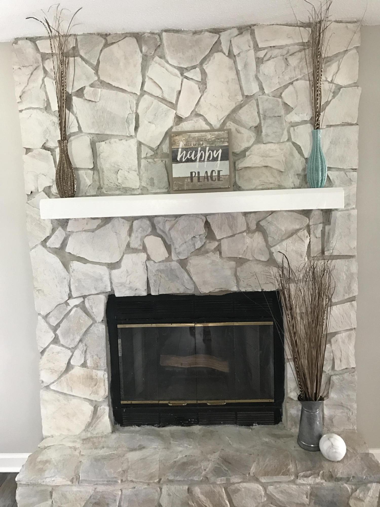 2839 Old Mill Way Crestview, FL 32539 - Photo 11 of 28 a wooden floor with a fireplace