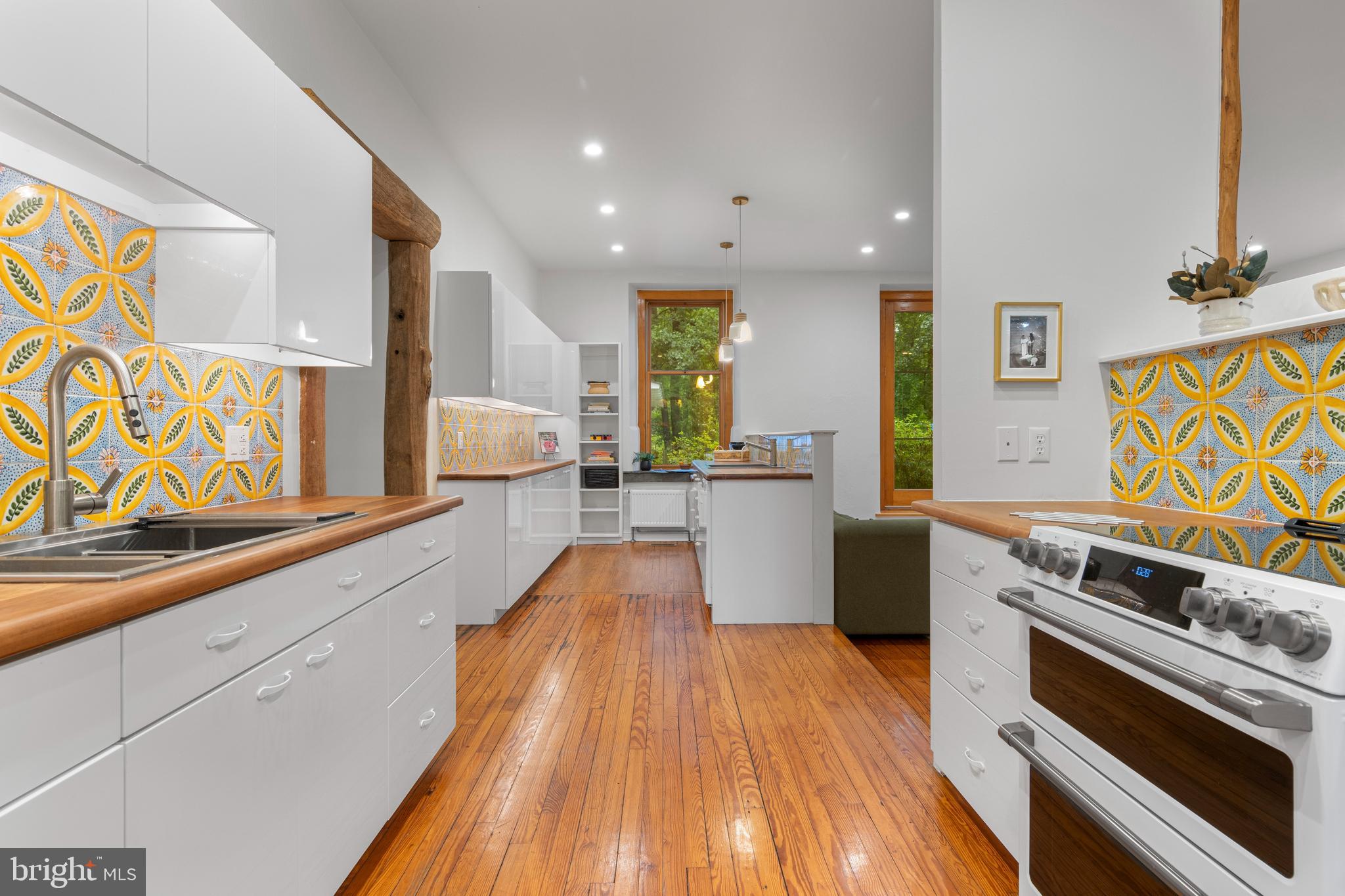 1420 Little Conestoga Road Glenmoore, PA 19343 - Photo 15 of 51 a kitchen with stainless steel appliances a stove a sink and a refrigerator