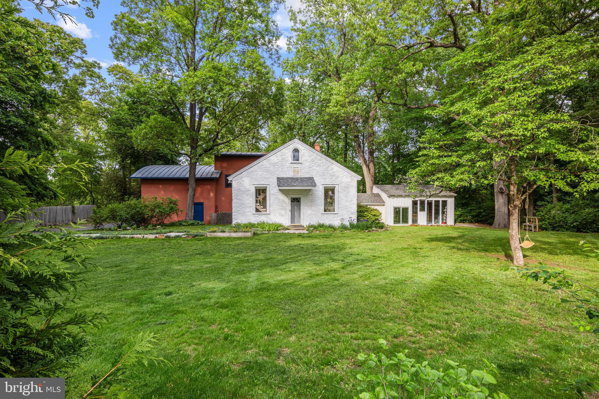 1420 Little Conestoga Road Glenmoore, PA 19343 - Photo 2 of 51 a front view of a house with a garden