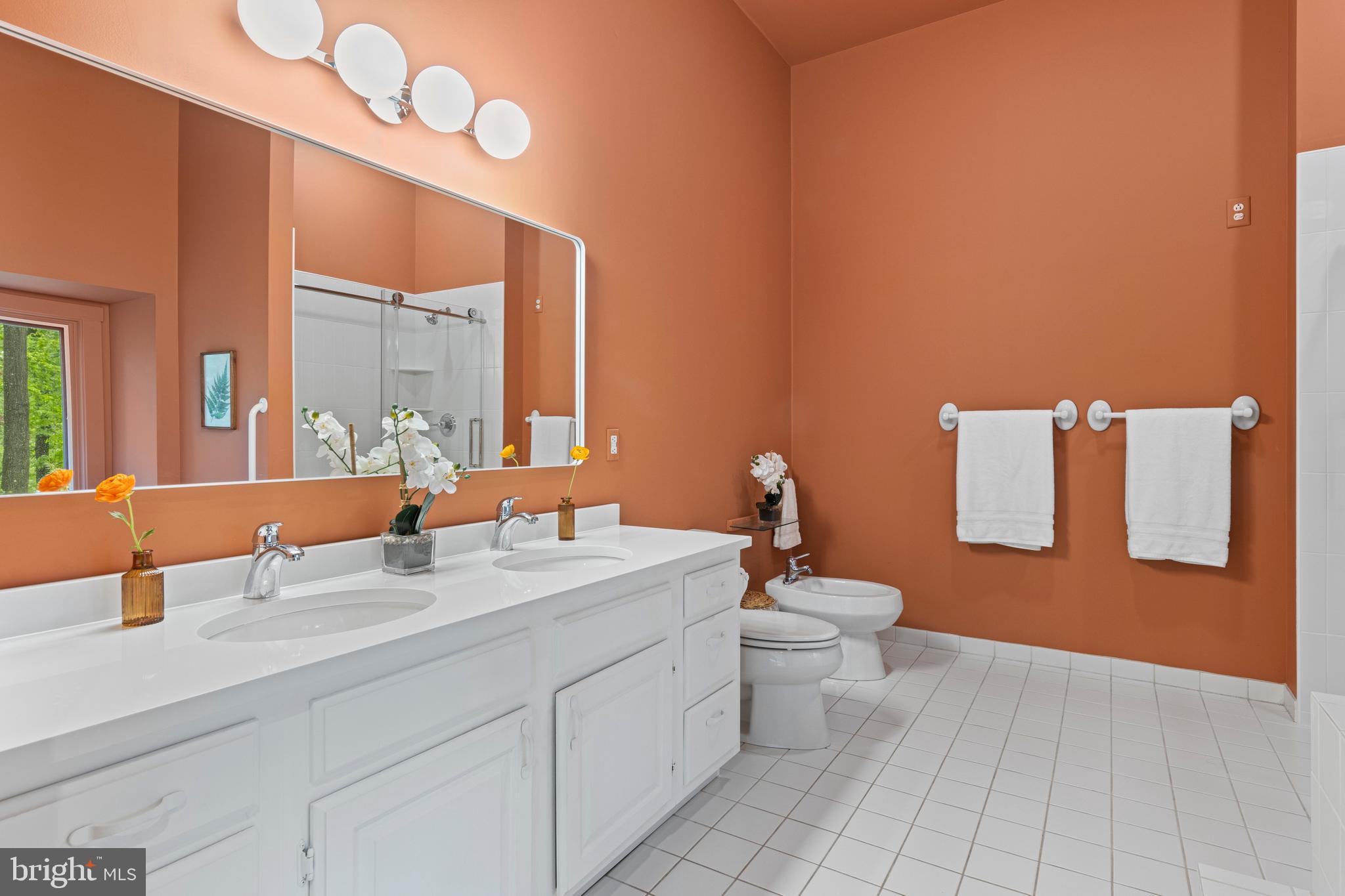 1420 Little Conestoga Road Glenmoore, PA 19343 - Photo 25 of 51 a bathroom with a double vanity sink toilet and a mirror