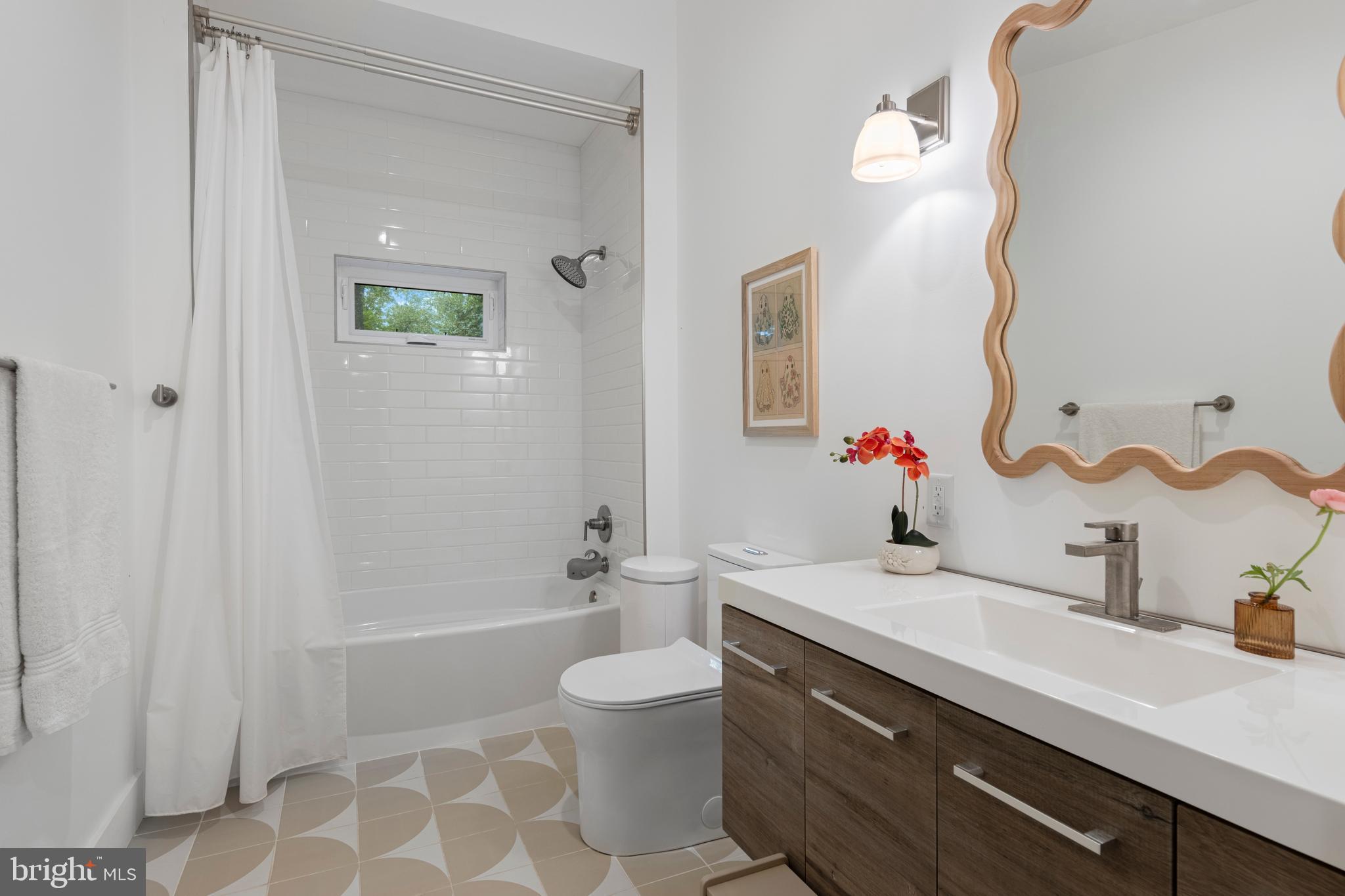 1420 Little Conestoga Road Glenmoore, PA 19343 - Photo 34 of 51 a bathroom with a sink a toilet and shower