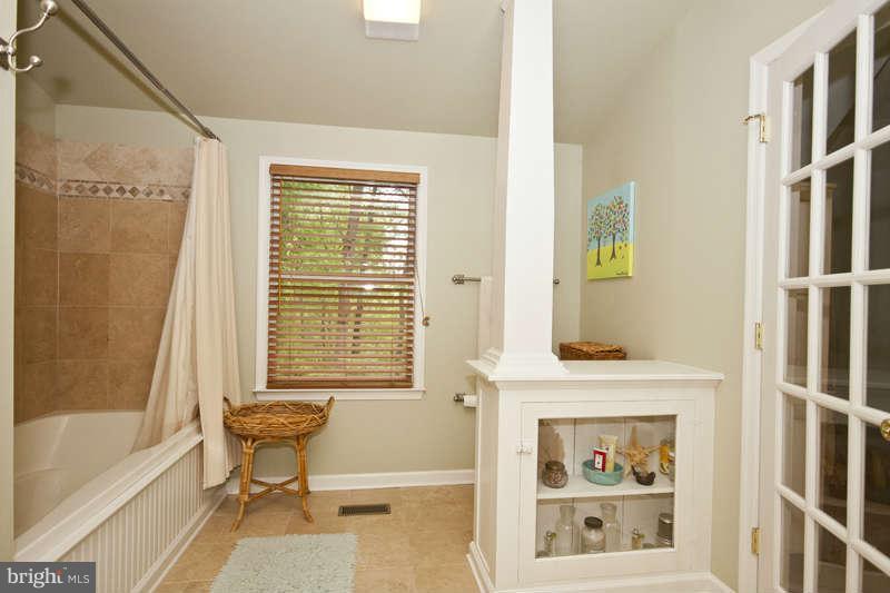115 Houck Road Westminster, MD 21157 - Photo 22 of 30 a living room with furniture and a window