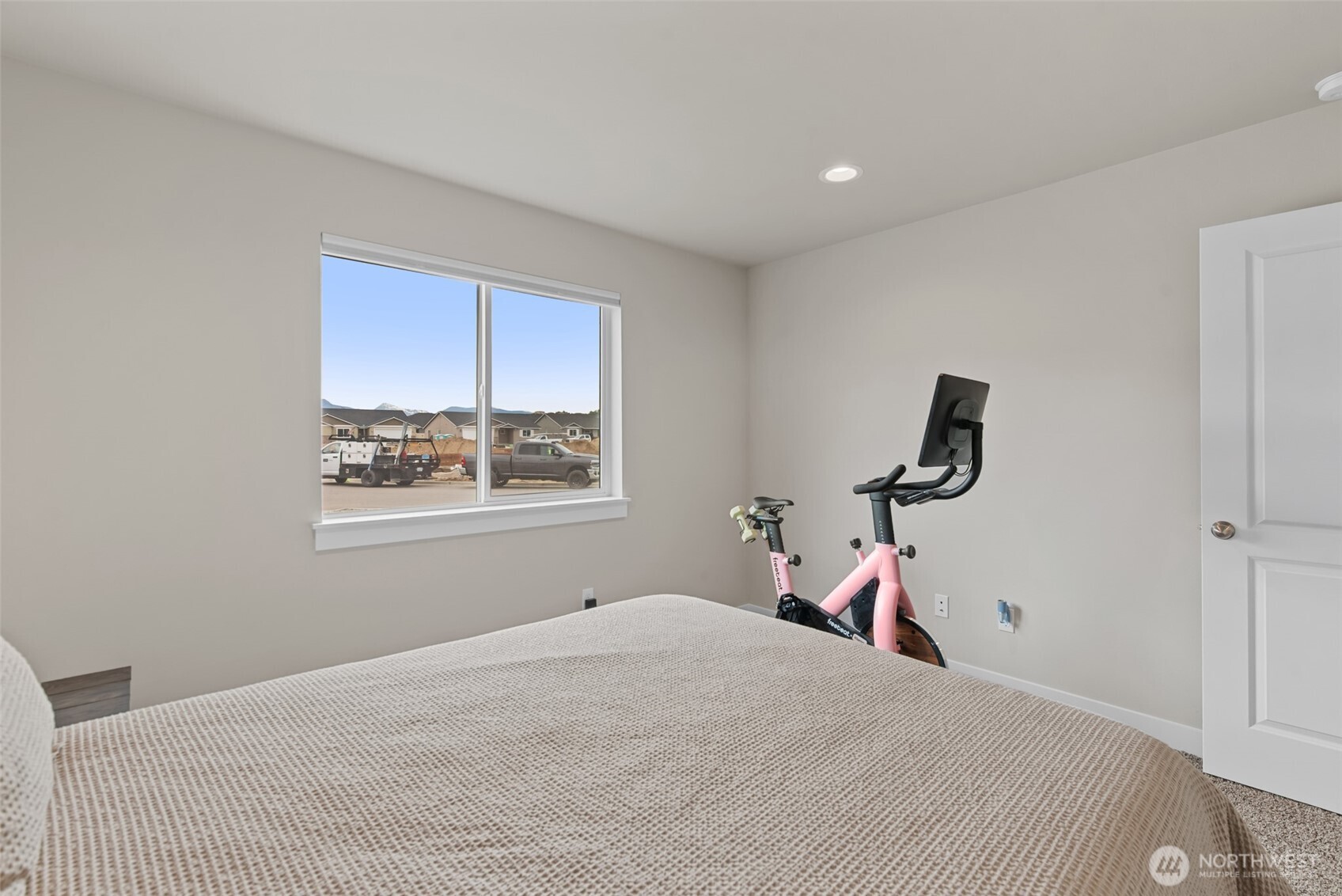282 Emma Drive Wenatchee, WA 98801 - Photo 24 of 38 a bedroom with a bed and a window