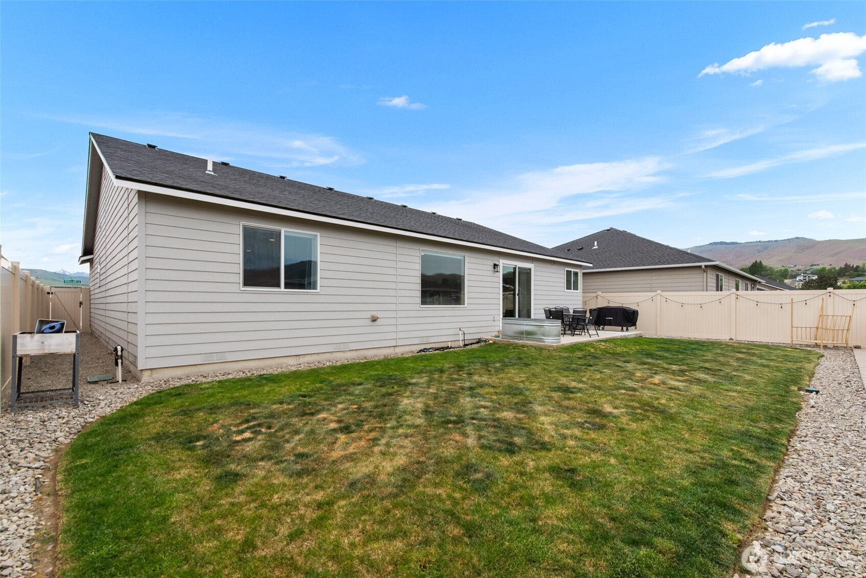 282 Emma Drive Wenatchee, WA 98801 - Photo 33 of 38 a view of a house with a backyard