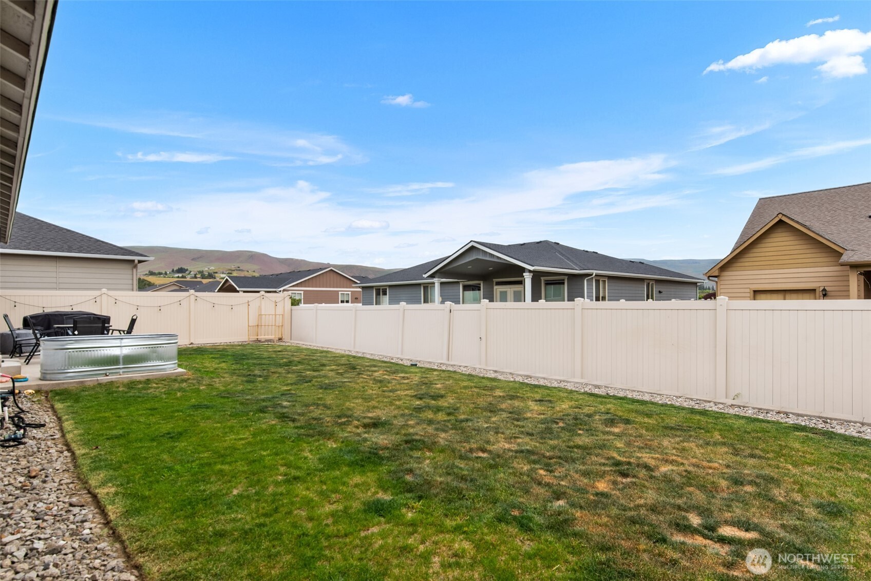282 Emma Drive Wenatchee, WA 98801 - Photo 35 of 38 a view of front of house with yard and seating area
