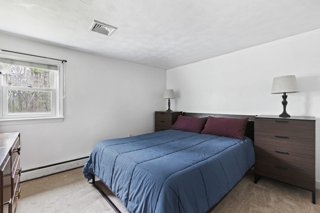 89 Richmond Road Freetown, MA 02702 - Photo 13 of 31 a bedroom with a bed and a window