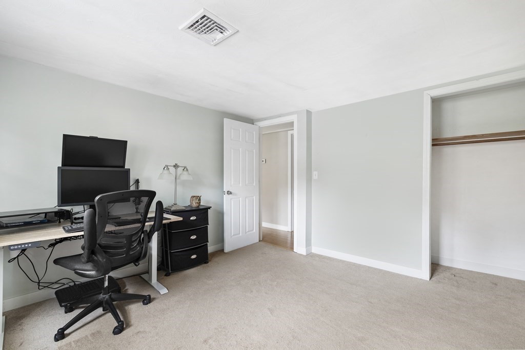 89 Richmond Road Freetown, MA 02702 - Photo 17 of 31 a view of a workspace with furniture