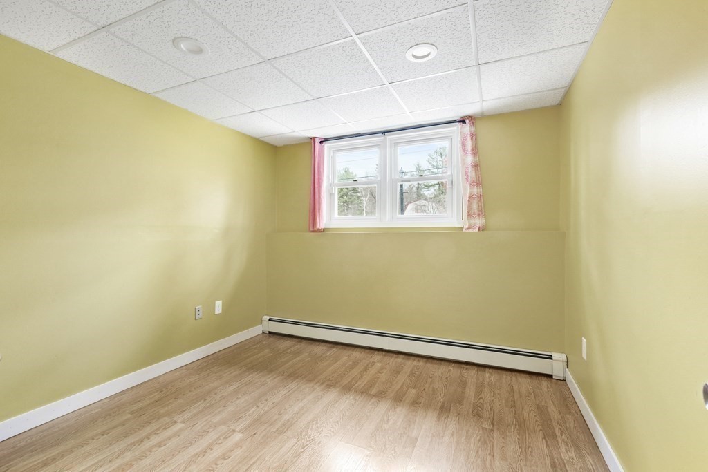 89 Richmond Road Freetown, MA 02702 - Photo 23 of 31 a view of room with wooden floor