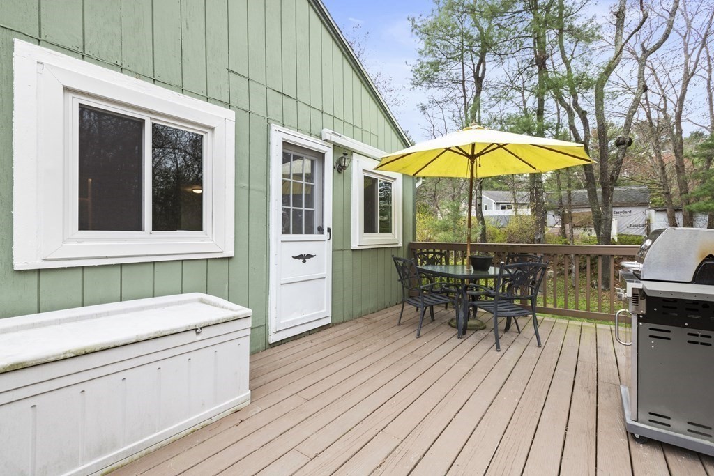 89 Richmond Road Freetown, MA 02702 - Photo 25 of 31 a view of a swimming pool with a table and chairs