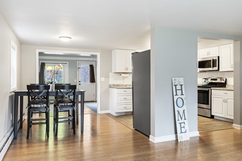 89 Richmond Road Freetown, MA 02702 - Photo 5 of 31 a view of a dining room with furniture and wooden floor