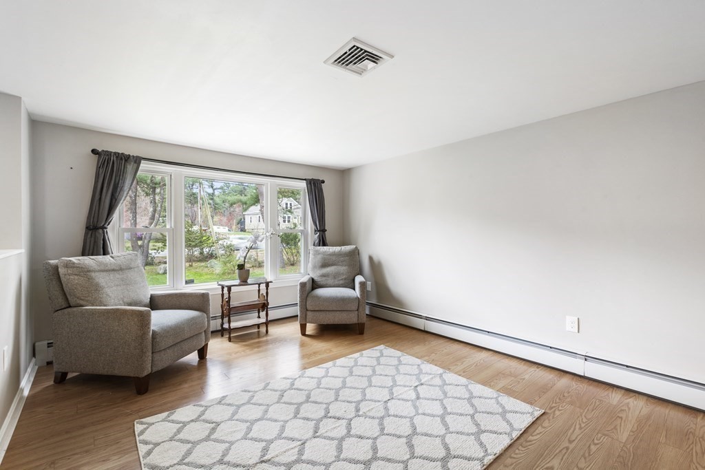 89 Richmond Road Freetown, MA 02702 - Photo 7 of 31 a living room with furniture and a large window