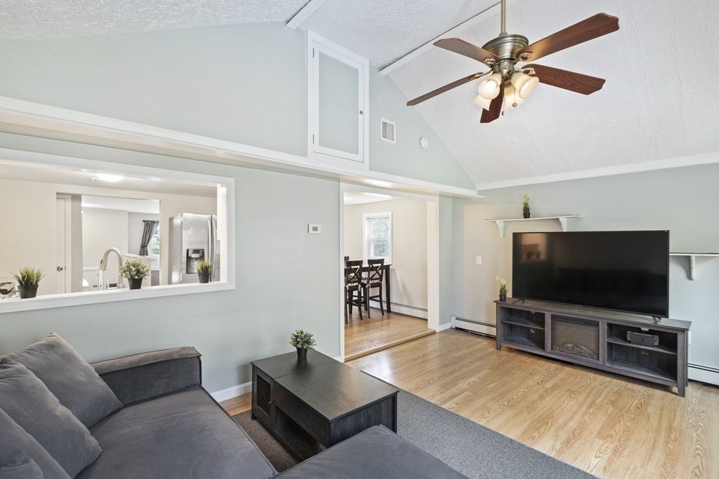 89 Richmond Road Freetown, MA 02702 - Photo 10 of 31 a living room with furniture and a flat screen tv