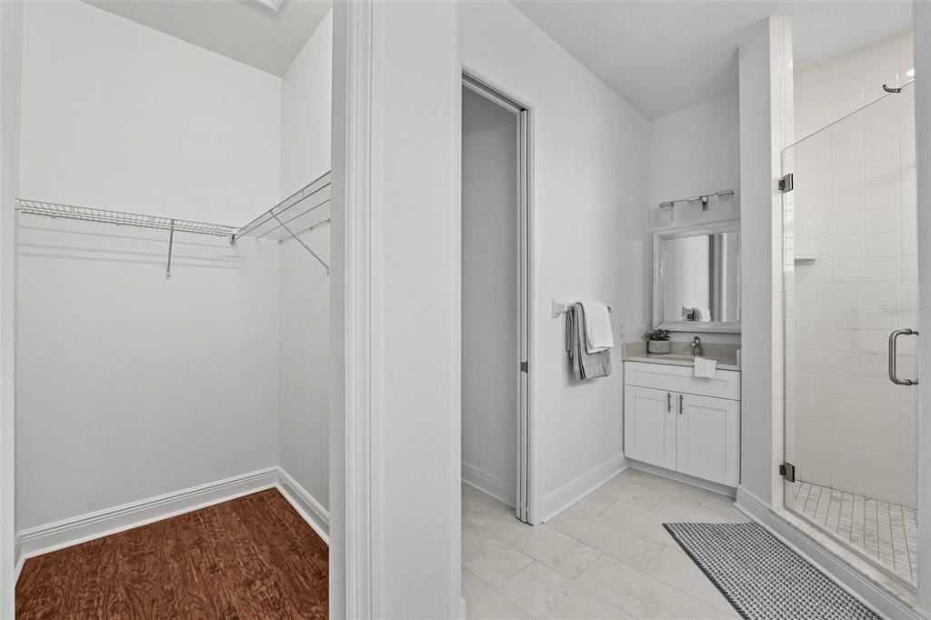 5730 Biscayne Court New Port Richey, FL 34652 - Photo 11 of 35 a bathroom with a sink a toilet and shower