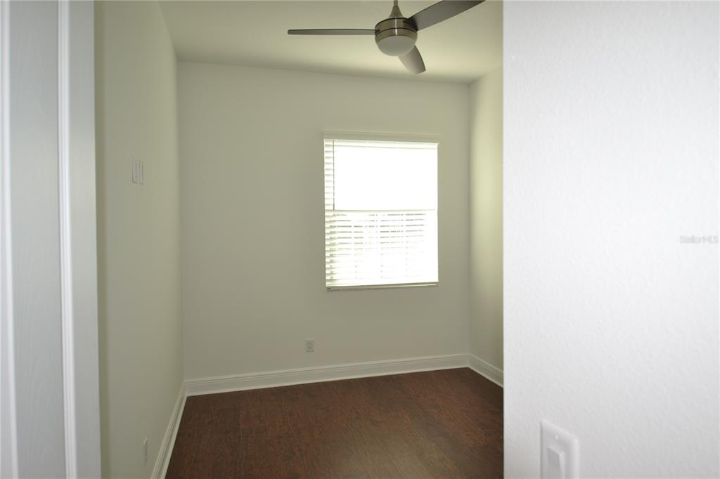 5730 Biscayne Court New Port Richey, FL 34652 - Photo 30 of 35 an empty room with a window