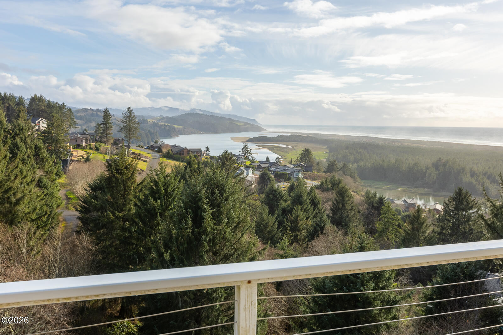 7415 East Summit Road Pacific City, OR 97135 - Photo 35 of 44 a view of a city from a balcony