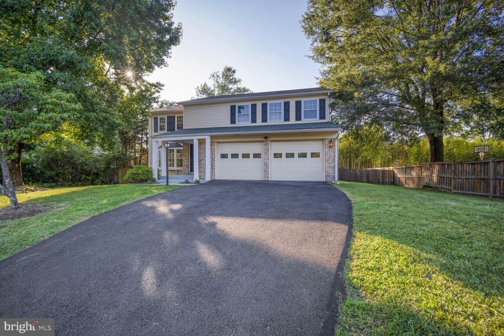13802 Poplar Tree Road Chantilly, VA 20151 - Photo 2 of 61 a view of house with yard and entertaining space