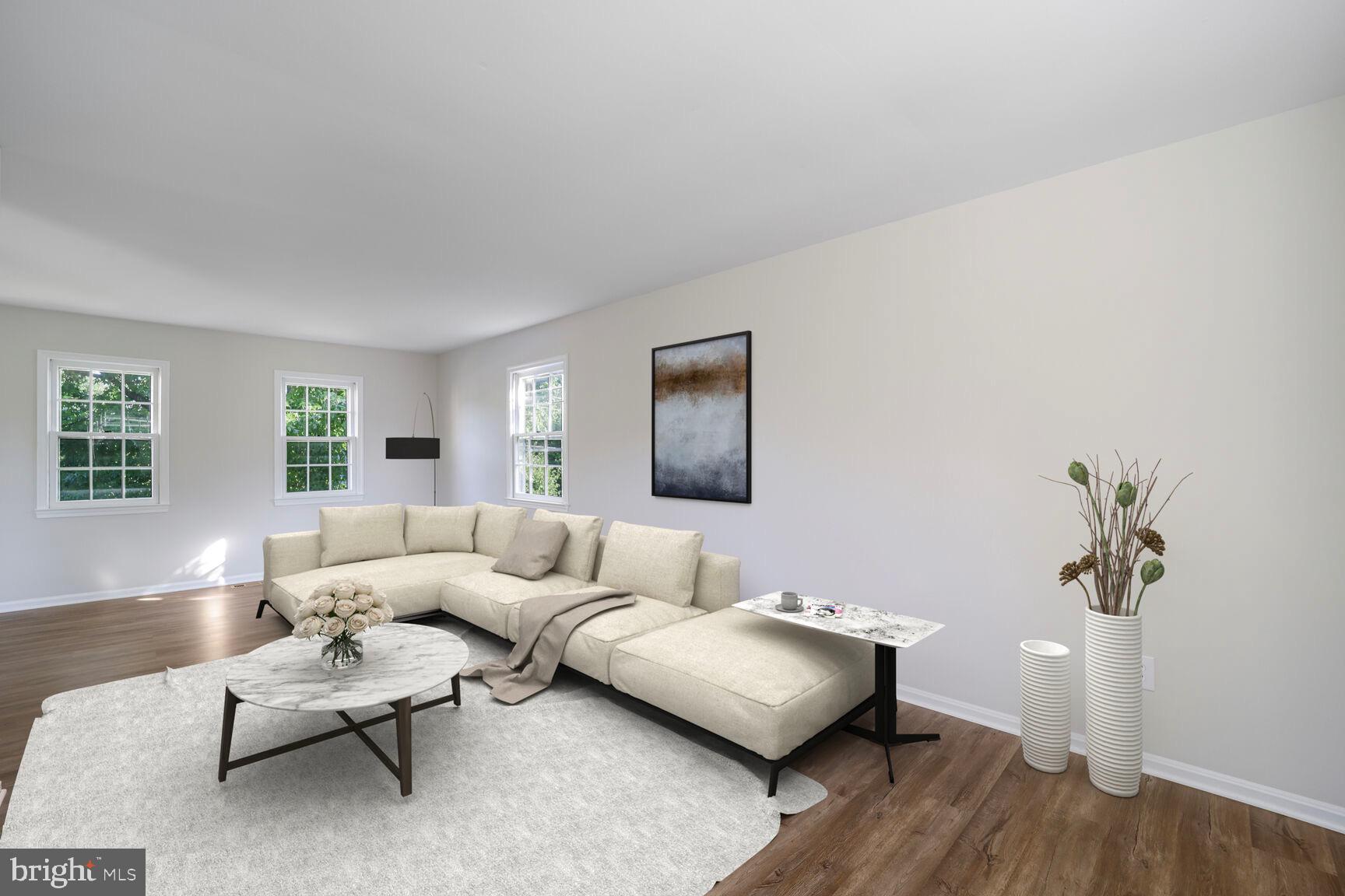 13802 Poplar Tree Road Chantilly, VA 20151 - Photo 29 of 61 a living room with furniture and wooden floor