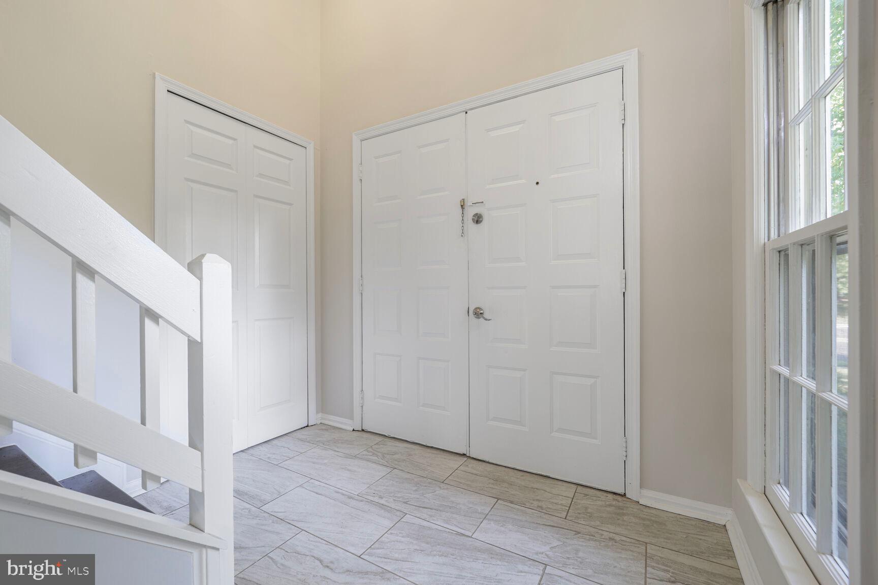 13802 Poplar Tree Road Chantilly, VA 20151 - Photo 3 of 61 a view of an entryway with wooden floor