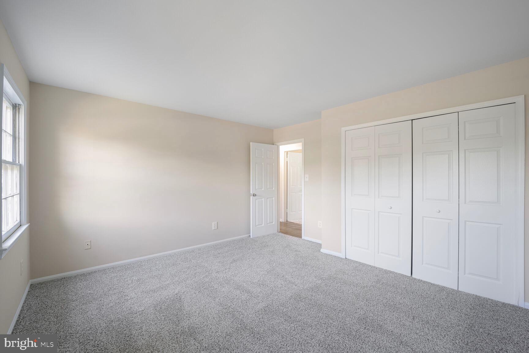 13802 Poplar Tree Road Chantilly, VA 20151 - Photo 35 of 61 a view of an empty room and a window