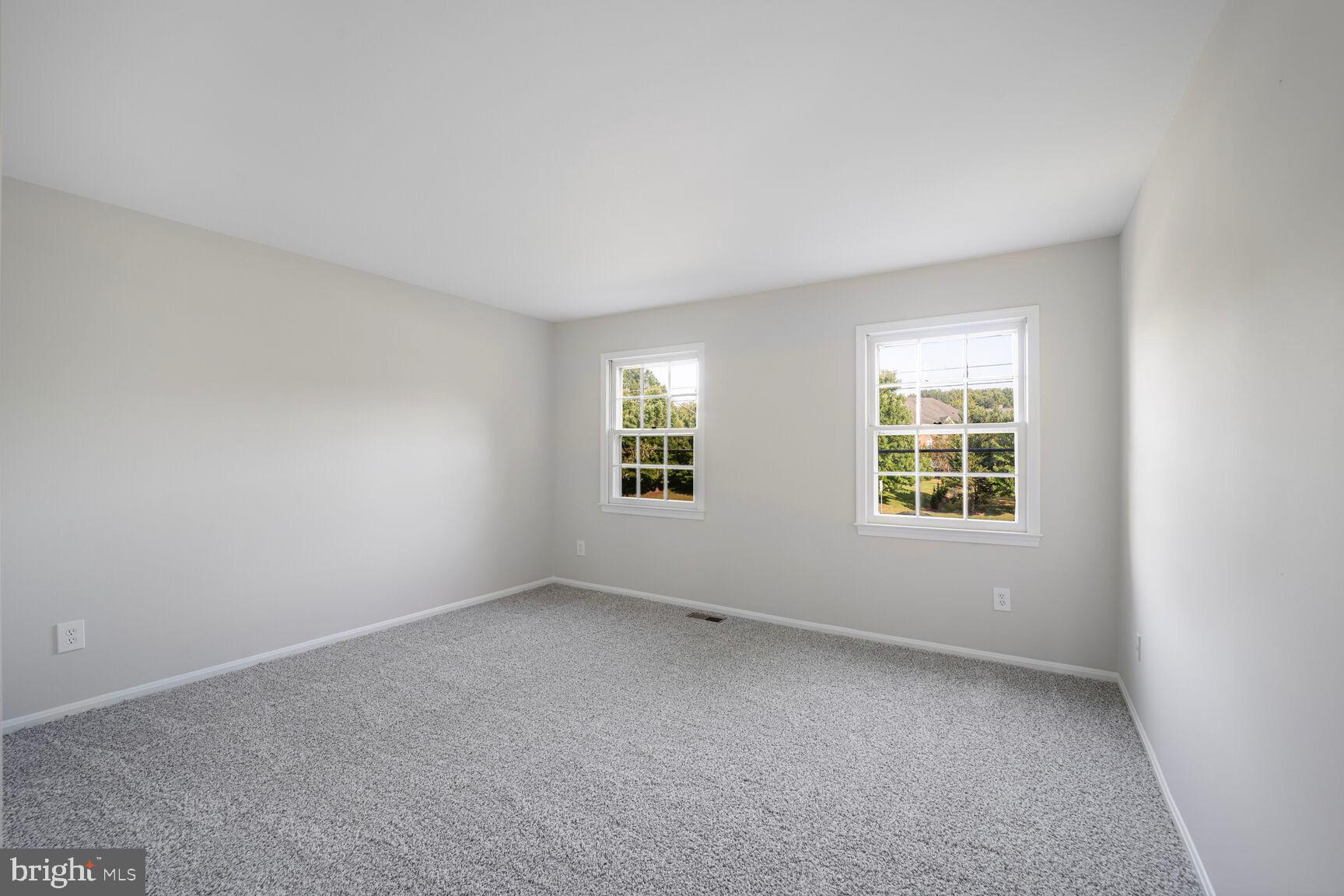 13802 Poplar Tree Road Chantilly, VA 20151 - Photo 36 of 61 an empty room with a window