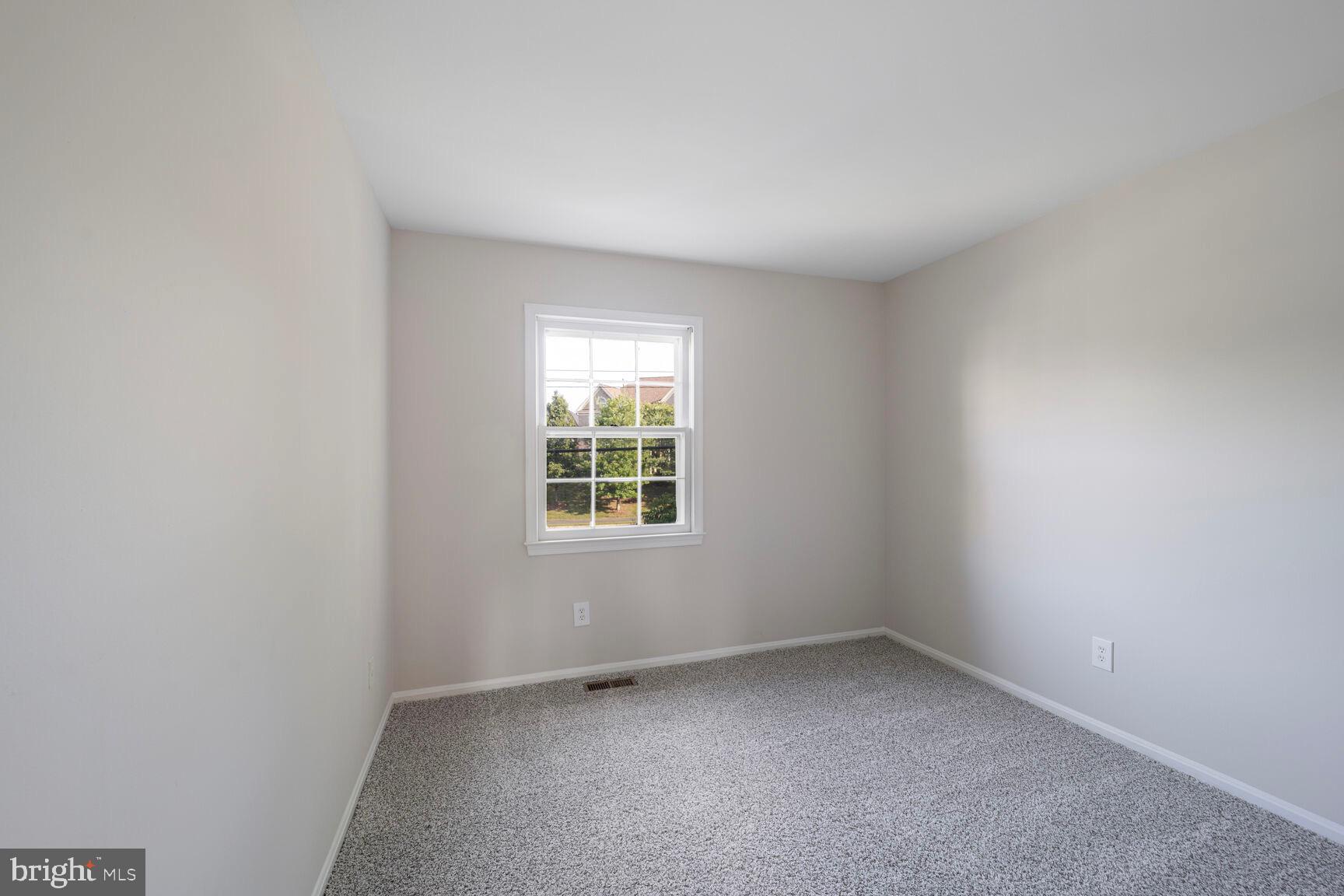 13802 Poplar Tree Road Chantilly, VA 20151 - Photo 38 of 61 an empty room with a window