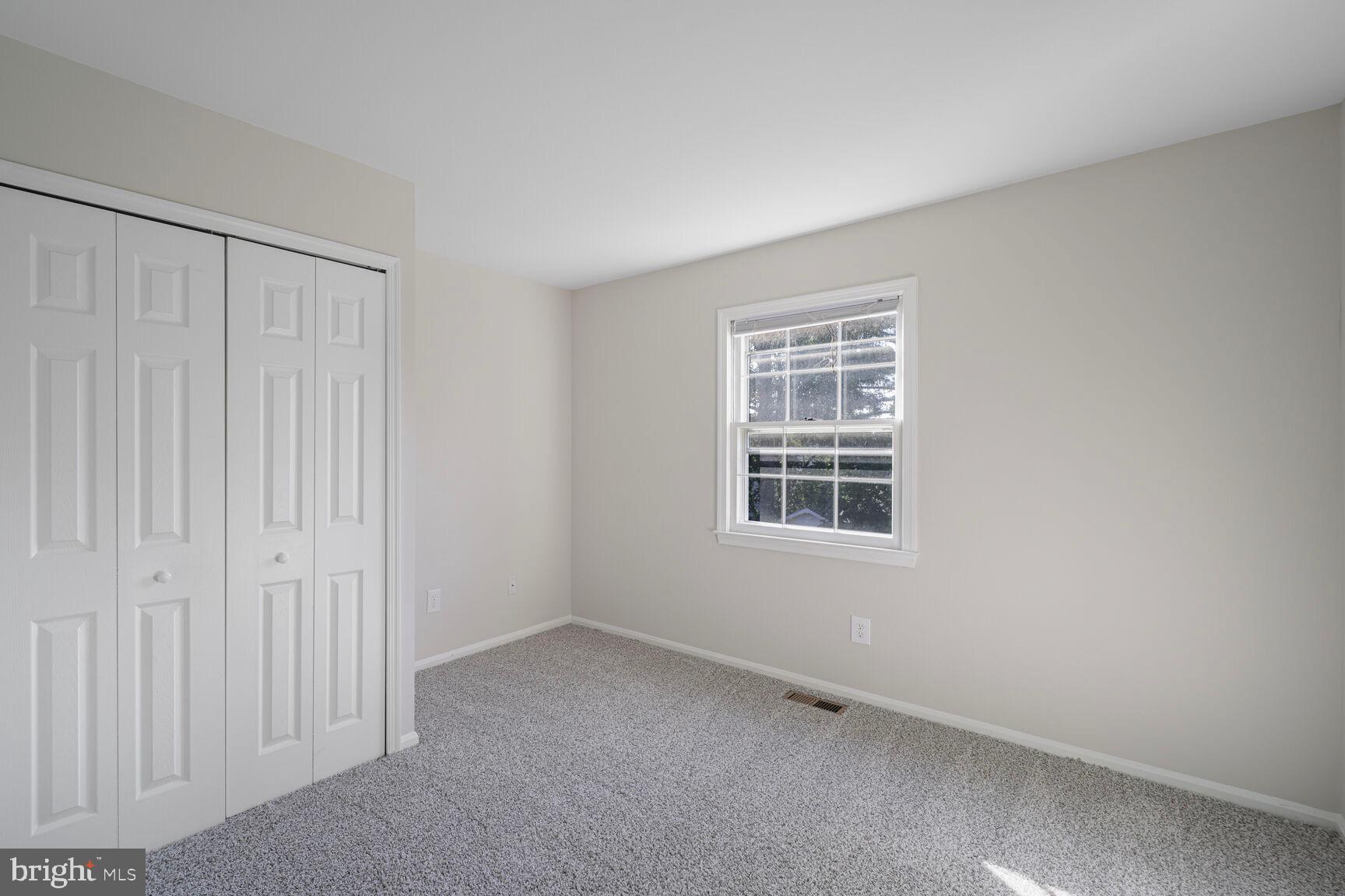13802 Poplar Tree Road Chantilly, VA 20151 - Photo 40 of 61 an empty room with a window