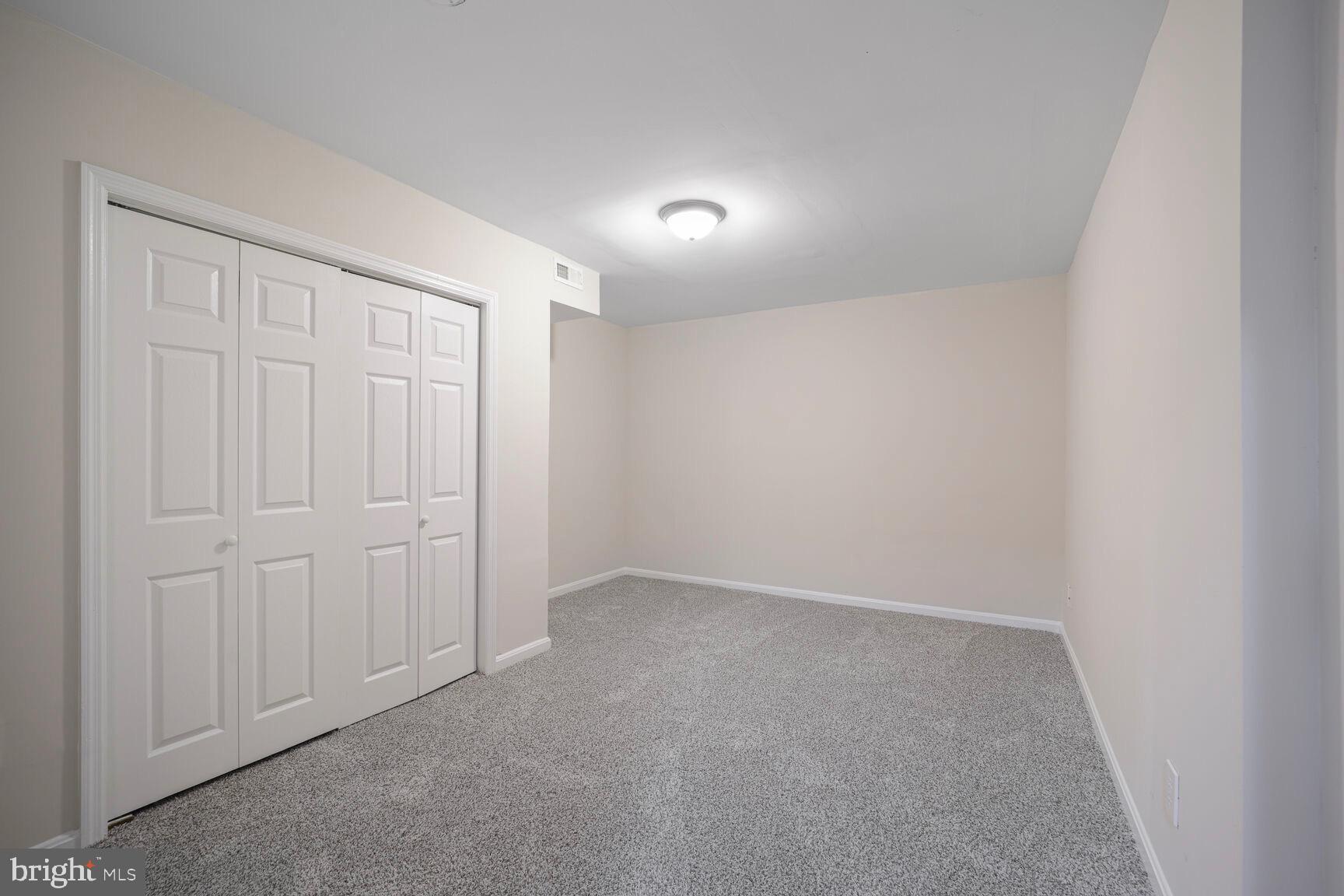 13802 Poplar Tree Road Chantilly, VA 20151 - Photo 44 of 61 an empty room with windows