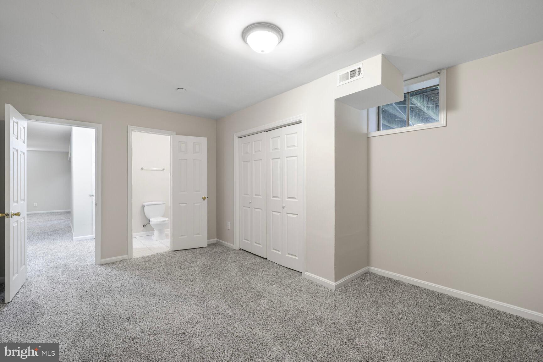 13802 Poplar Tree Road Chantilly, VA 20151 - Photo 45 of 61 an empty room with a bathroom