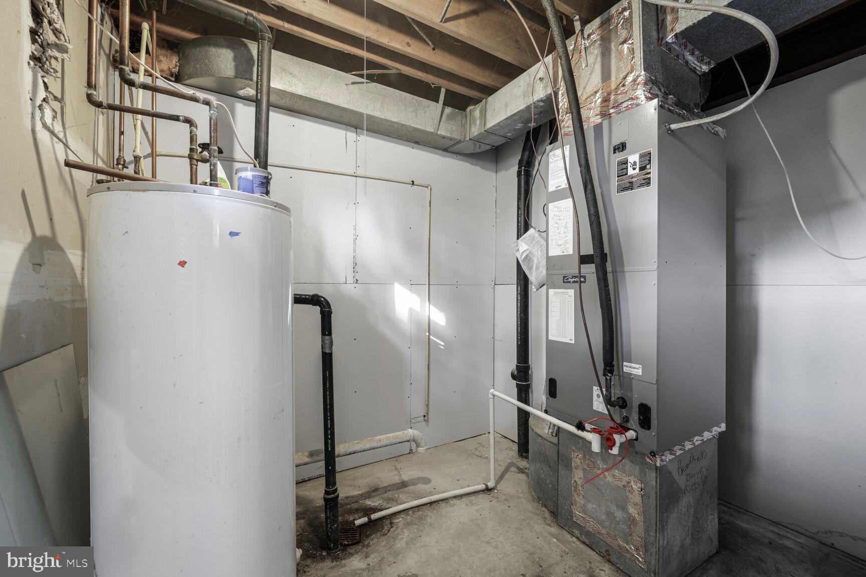 13802 Poplar Tree Road Chantilly, VA 20151 - Photo 47 of 61 a view of water heater room