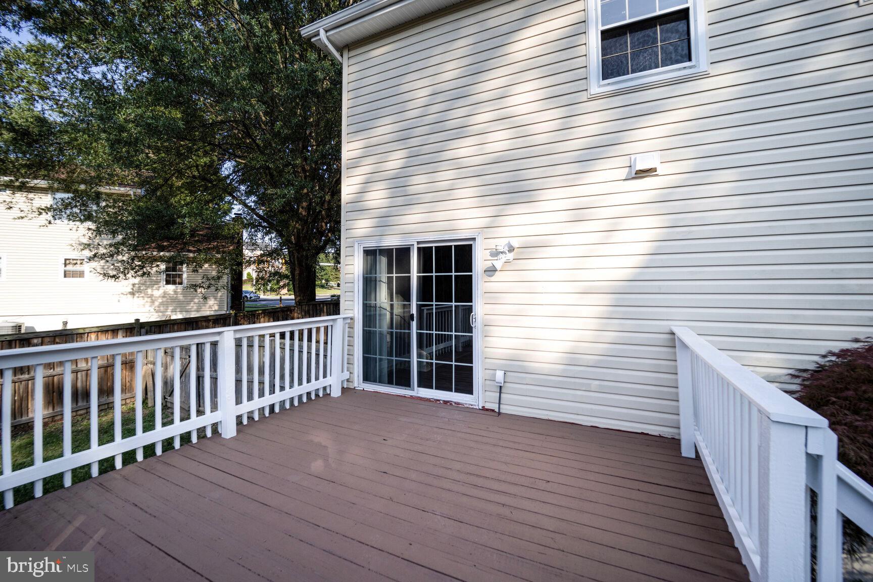 13802 Poplar Tree Road Chantilly, VA 20151 - Photo 49 of 61 a view of a wooden deck