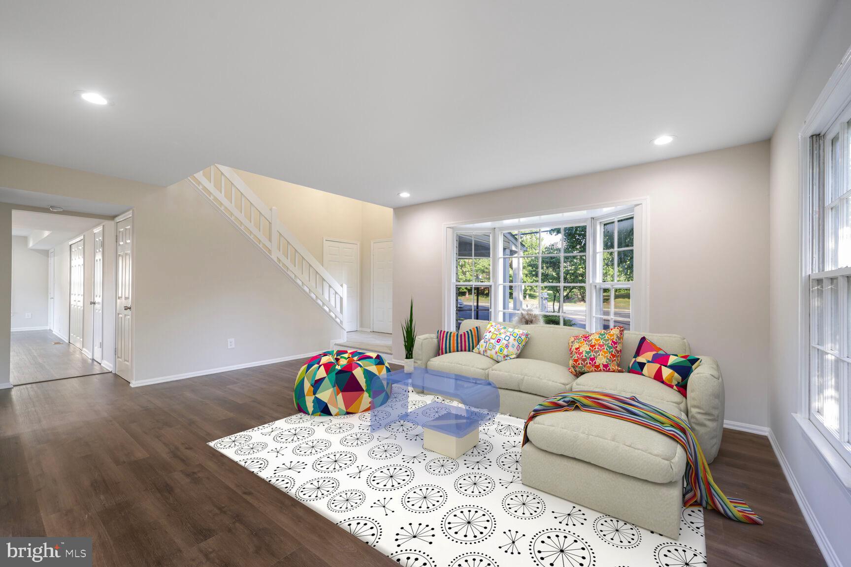 13802 Poplar Tree Road Chantilly, VA 20151 - Photo 5 of 61 a living room with furniture and a wooden floor