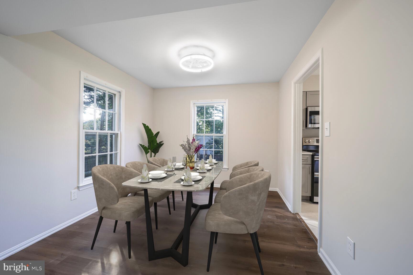 13802 Poplar Tree Road Chantilly, VA 20151 - Photo 9 of 61 a dining room with furniture and window