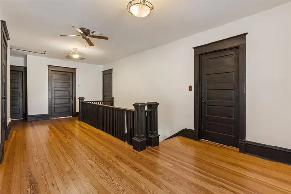 a view of a livingroom with wooden floor