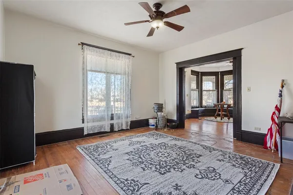 a living room with furniture and a rug