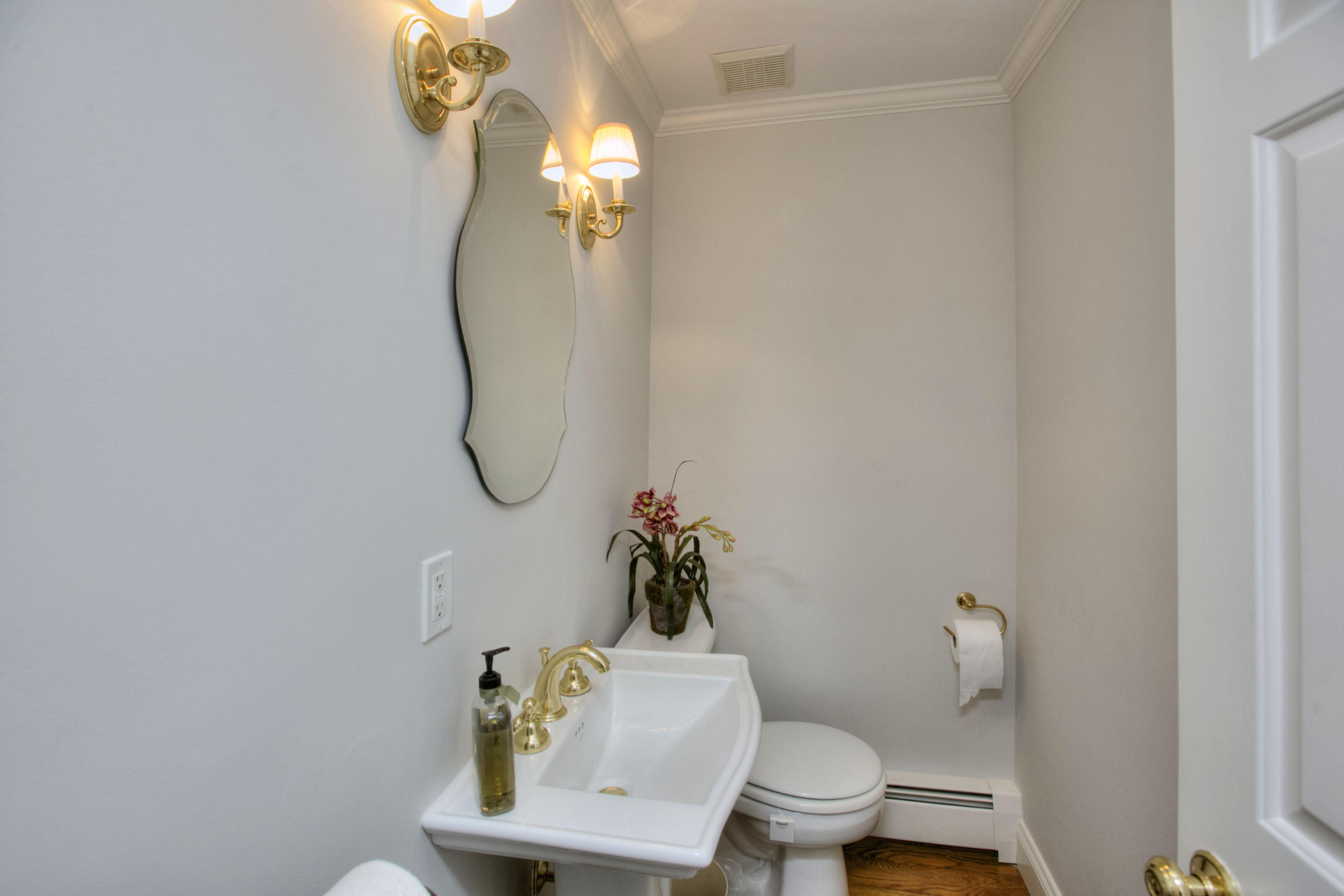 20 Hollow Tree Ridge Road Darien, CT 06820 - Photo 13 of 25 a bathroom with a toilet and a sink