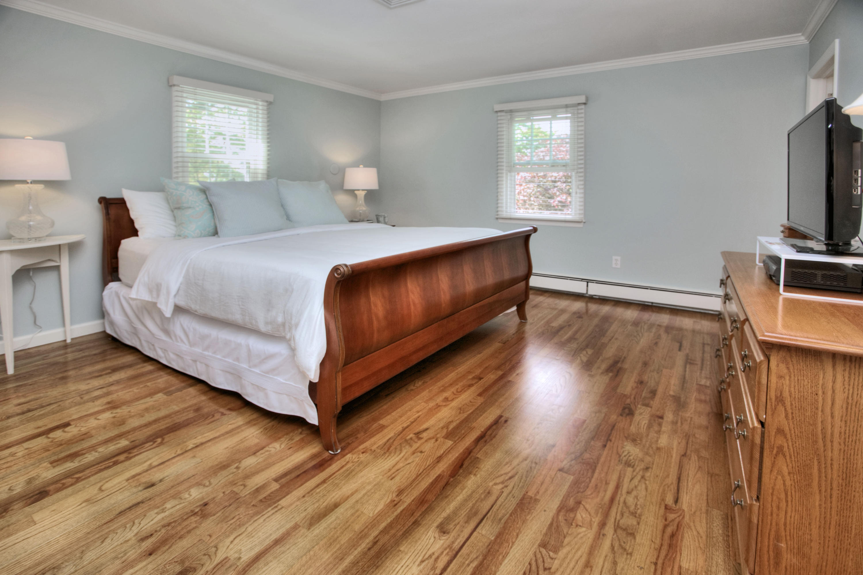 20 Hollow Tree Ridge Road Darien, CT 06820 - Photo 15 of 25 a bedroom with a bed and a flat screen tv