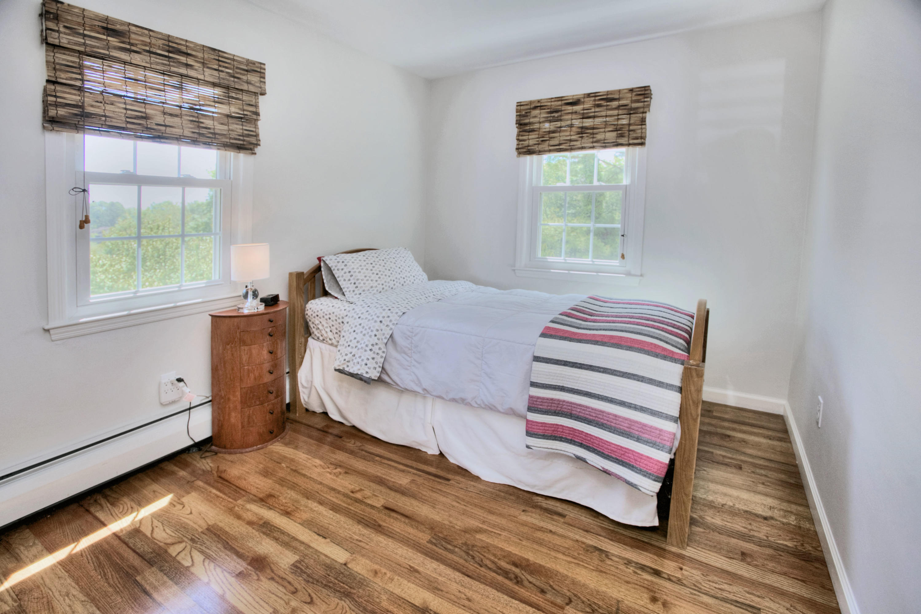 20 Hollow Tree Ridge Road Darien, CT 06820 - Photo 21 of 25 a bedroom with a bed and a window