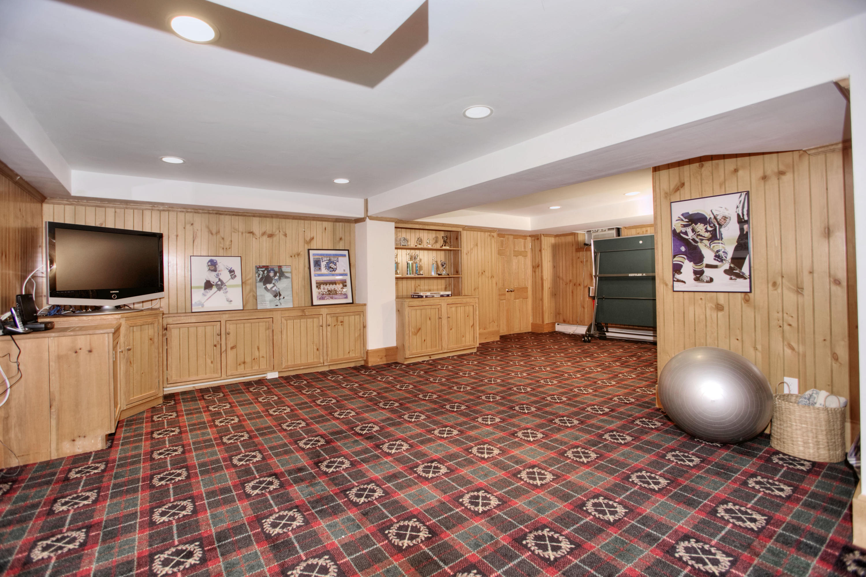 20 Hollow Tree Ridge Road Darien, CT 06820 - Photo 22 of 25 a living room with a flat screen tv and view of a living room