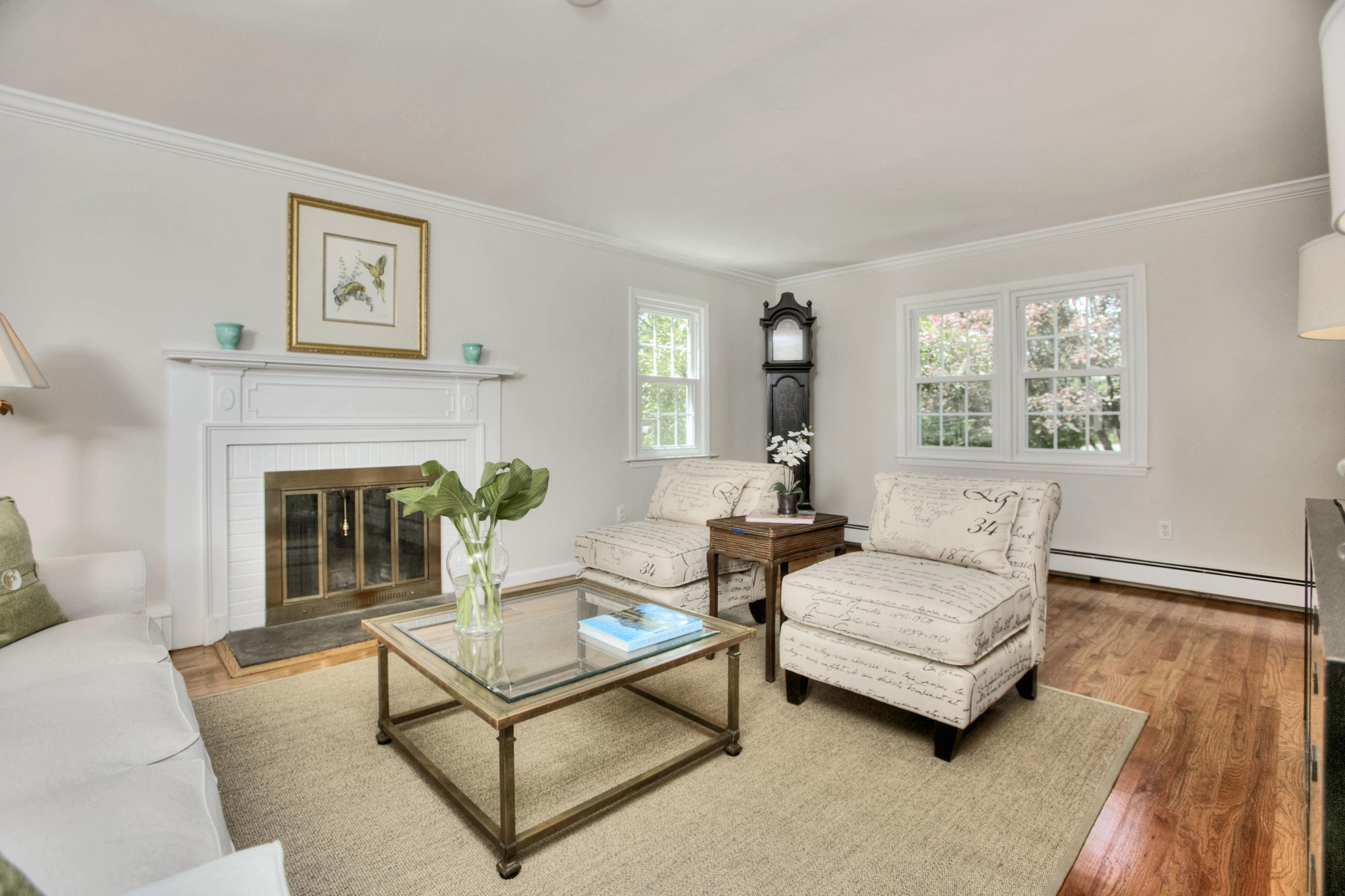 20 Hollow Tree Ridge Road Darien, CT 06820 - Photo 5 of 25 a living room with furniture and a fireplace