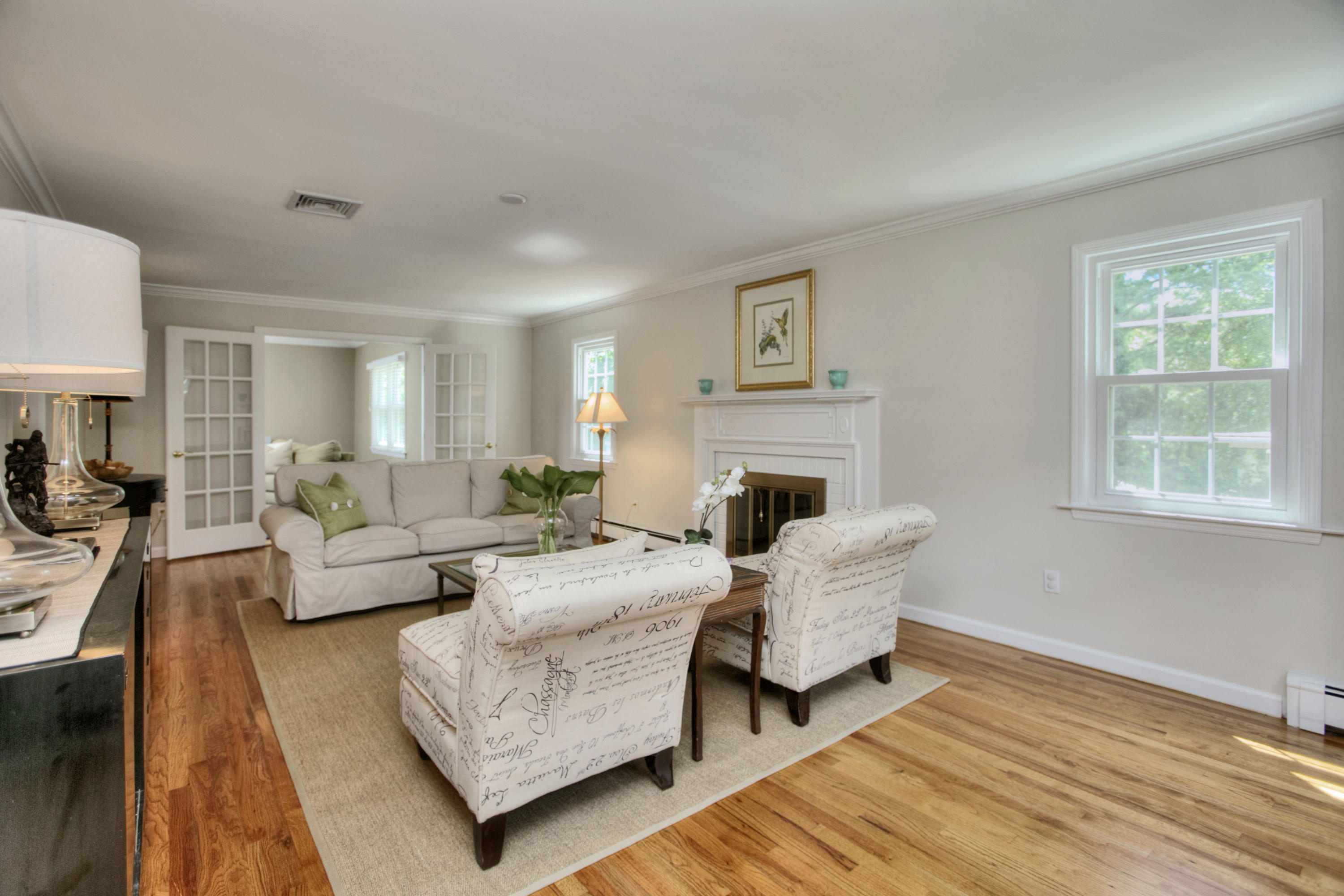 20 Hollow Tree Ridge Road Darien, CT 06820 - Photo 6 of 25 a living room with furniture and a fireplace