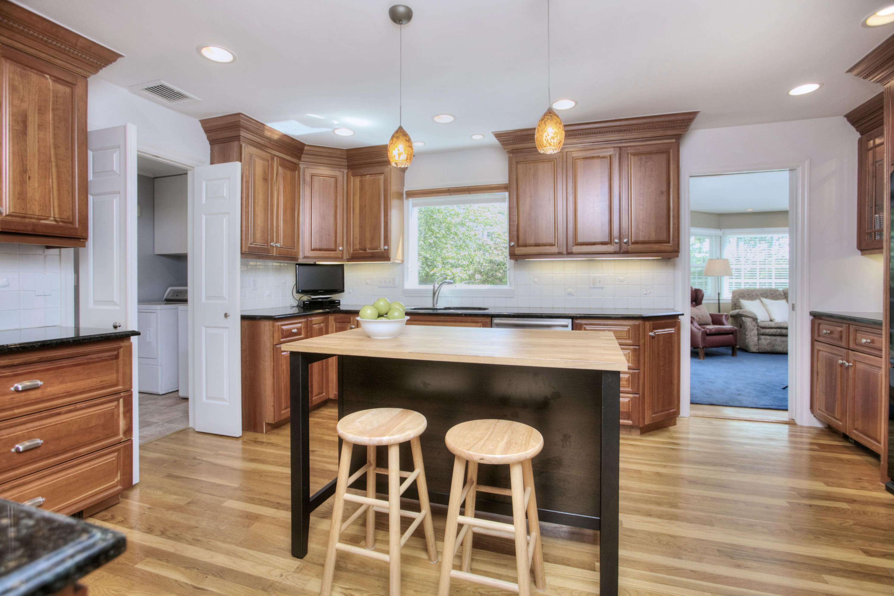20 Hollow Tree Ridge Road Darien, CT 06820 - Photo 10 of 25 a kitchen with granite countertop white cabinets and stainless steel appliances